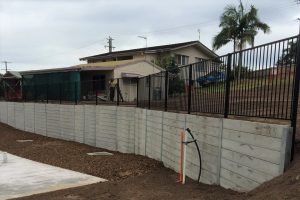 Durawall retaining wall with metal fence for subdivision in Bli Bli