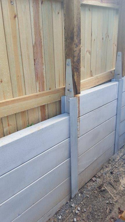 Fence bracket with Durawall retaining wall